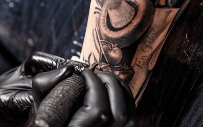 Close up tattoo artist